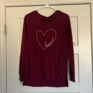 C. Wonder Long sleeved maroon t shirt. “Amore” print. Excellent used condition.